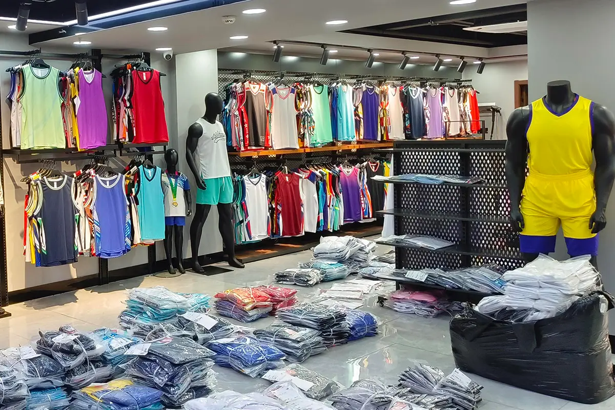 Individually packed jerseys arranged by style and color