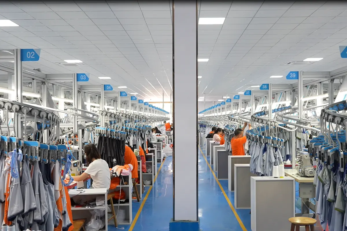 Numbered sewing stations inside the jersey workshop
