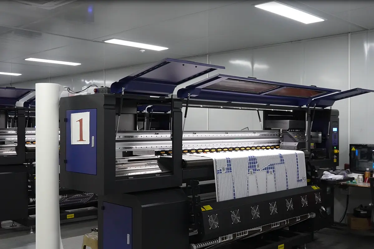 Wide-format printer producing a numbered jersey panel