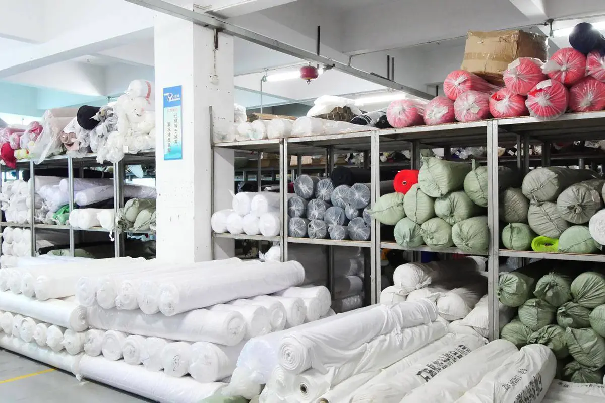 Fabric rolls organized in the material storage area