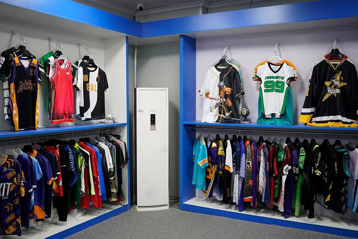Basketball, American football, hockey, and other jersey samples on display