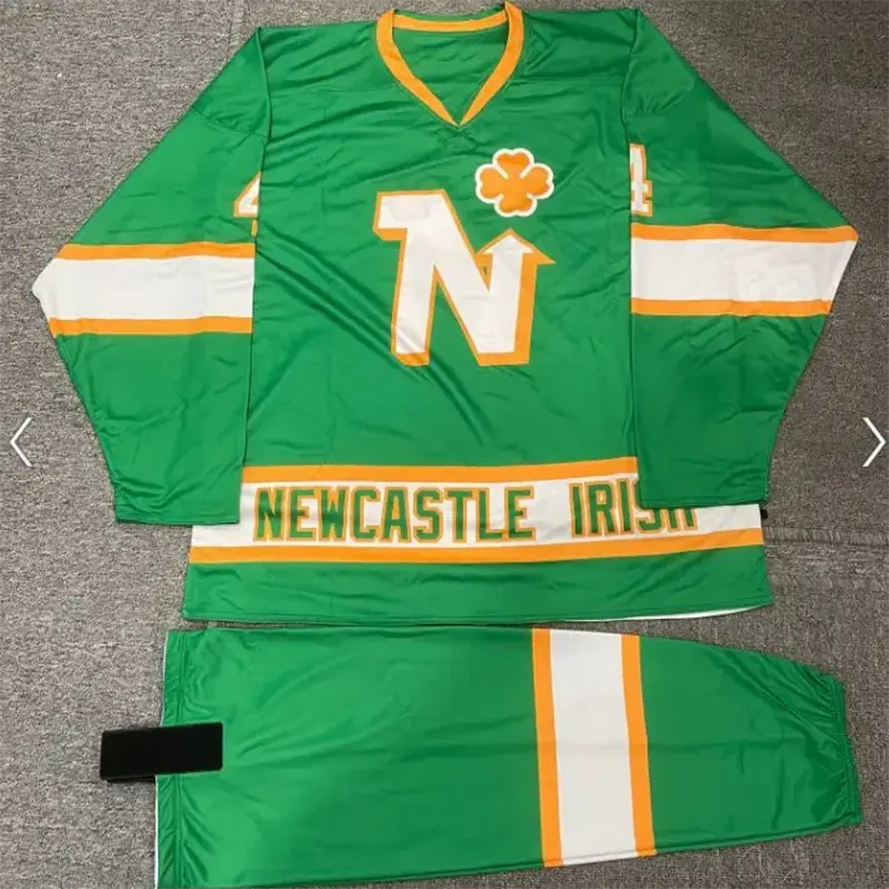 Green, white, and orange hockey jersey and pants set
