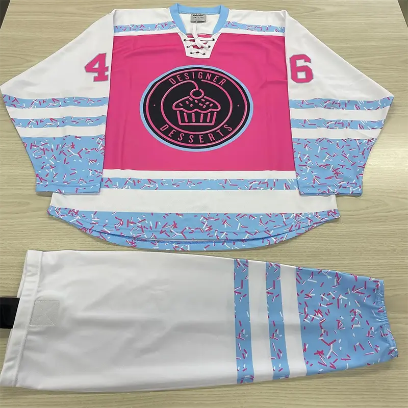 Pink, white, and light blue hockey jersey and pants set with number 46