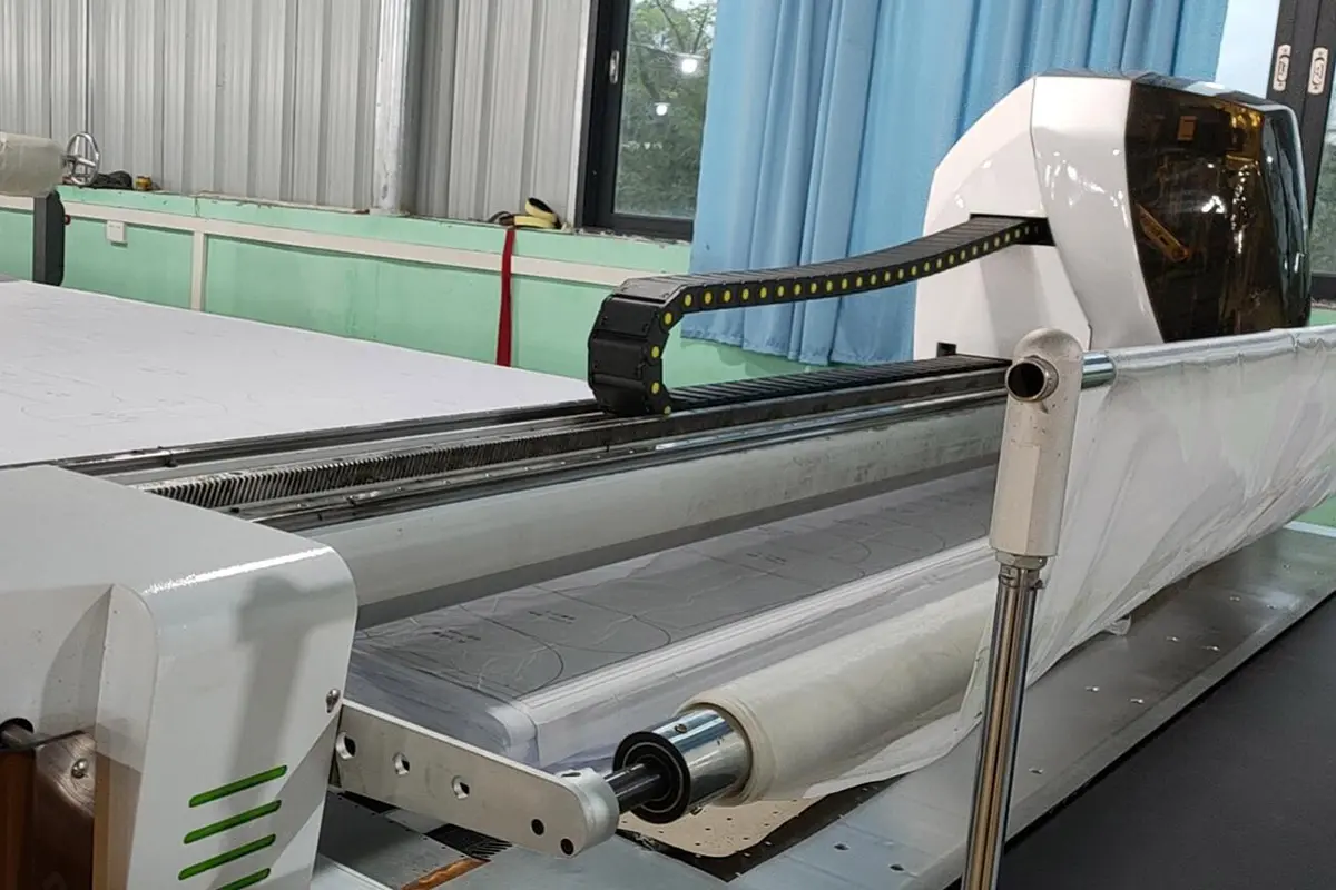 Fabric roll loaded on a digital cutting machine