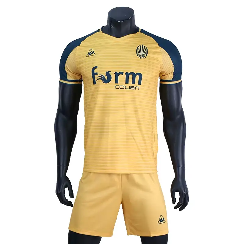 Front view of a yellow and navy soccer jersey with matching shorts