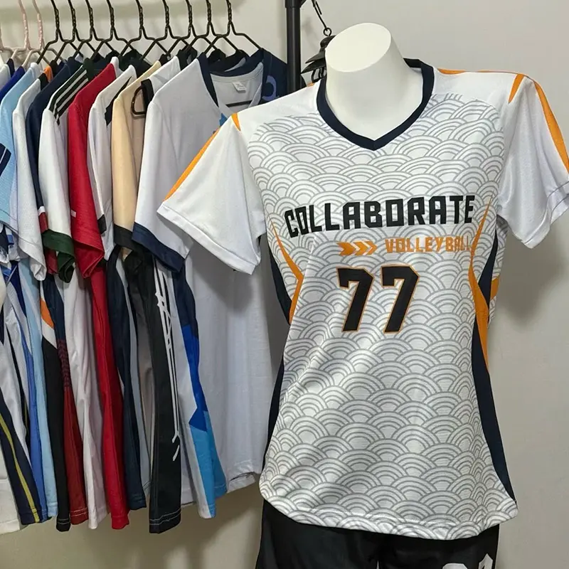 White and orange patterned volleyball jersey with number 77
