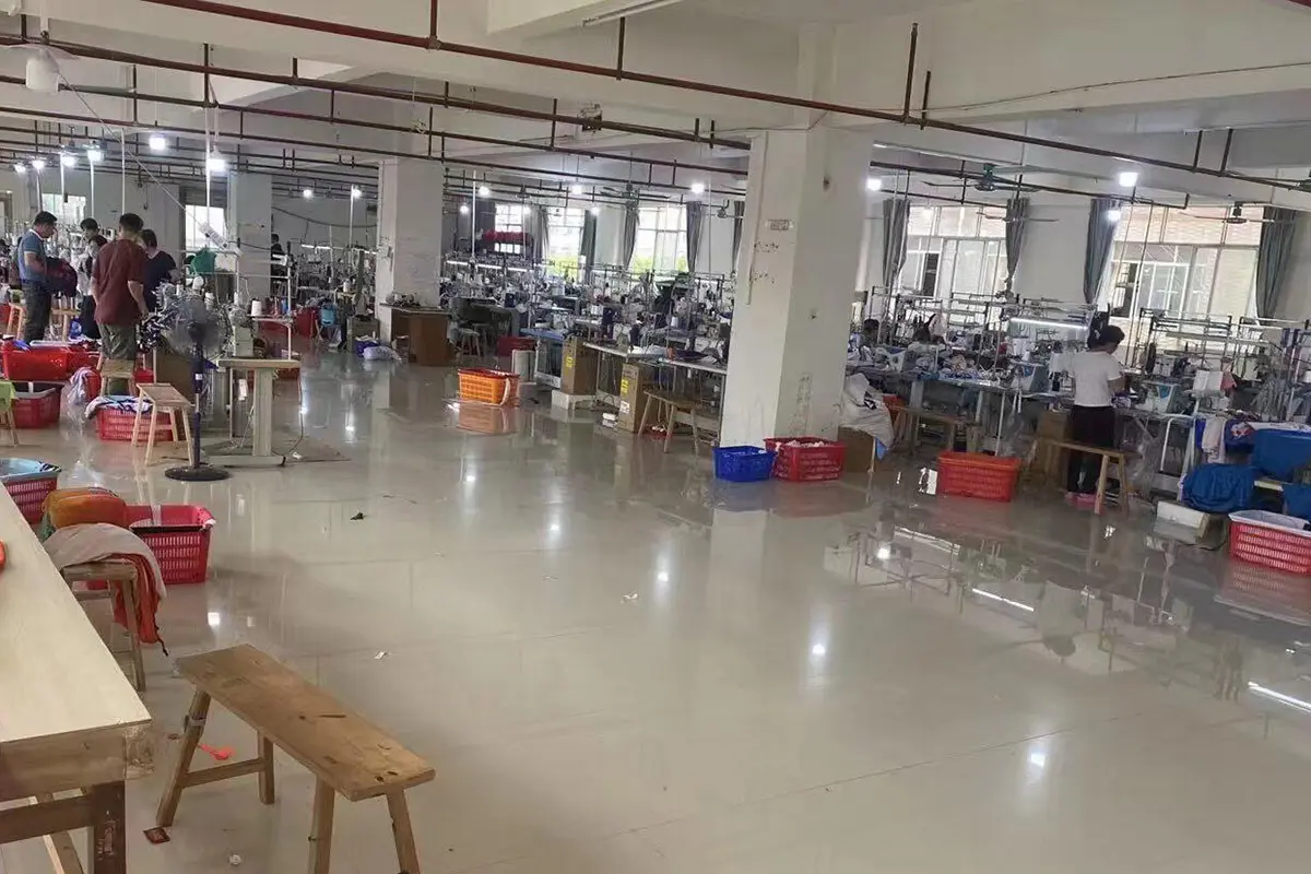 Jersey sewing floor with work baskets beside production stations