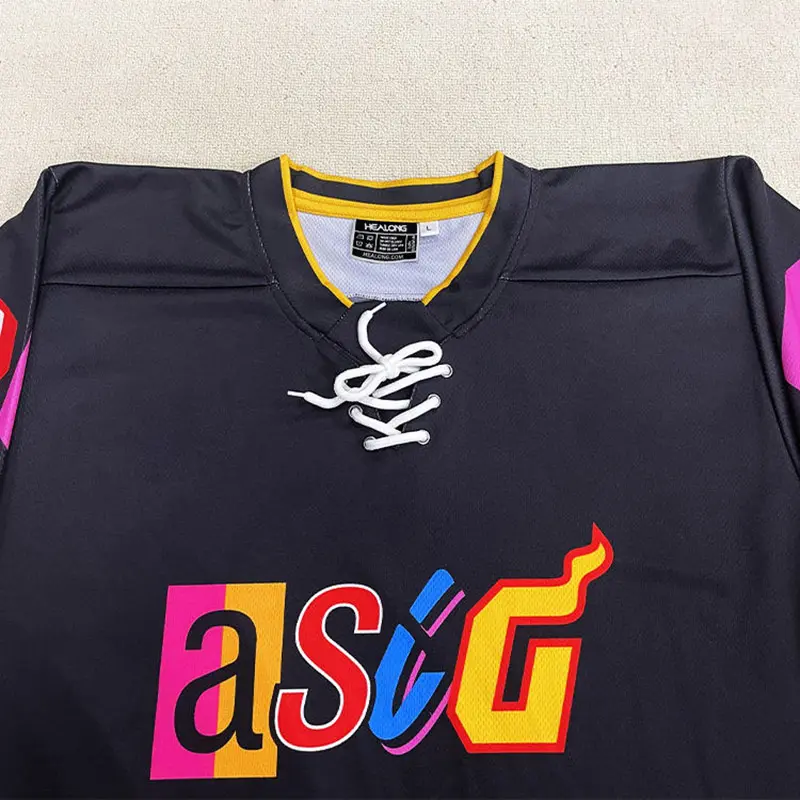 Black hockey jersey with a woven neck label and lace-up collar