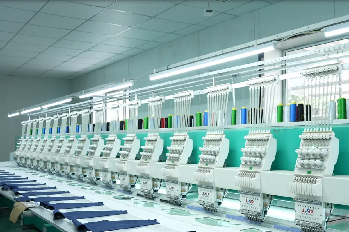 Multihead embroidery machine working on dark jersey panels