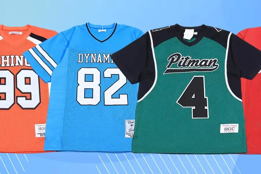 Orange, blue, green, and red numbered team jerseys displayed together